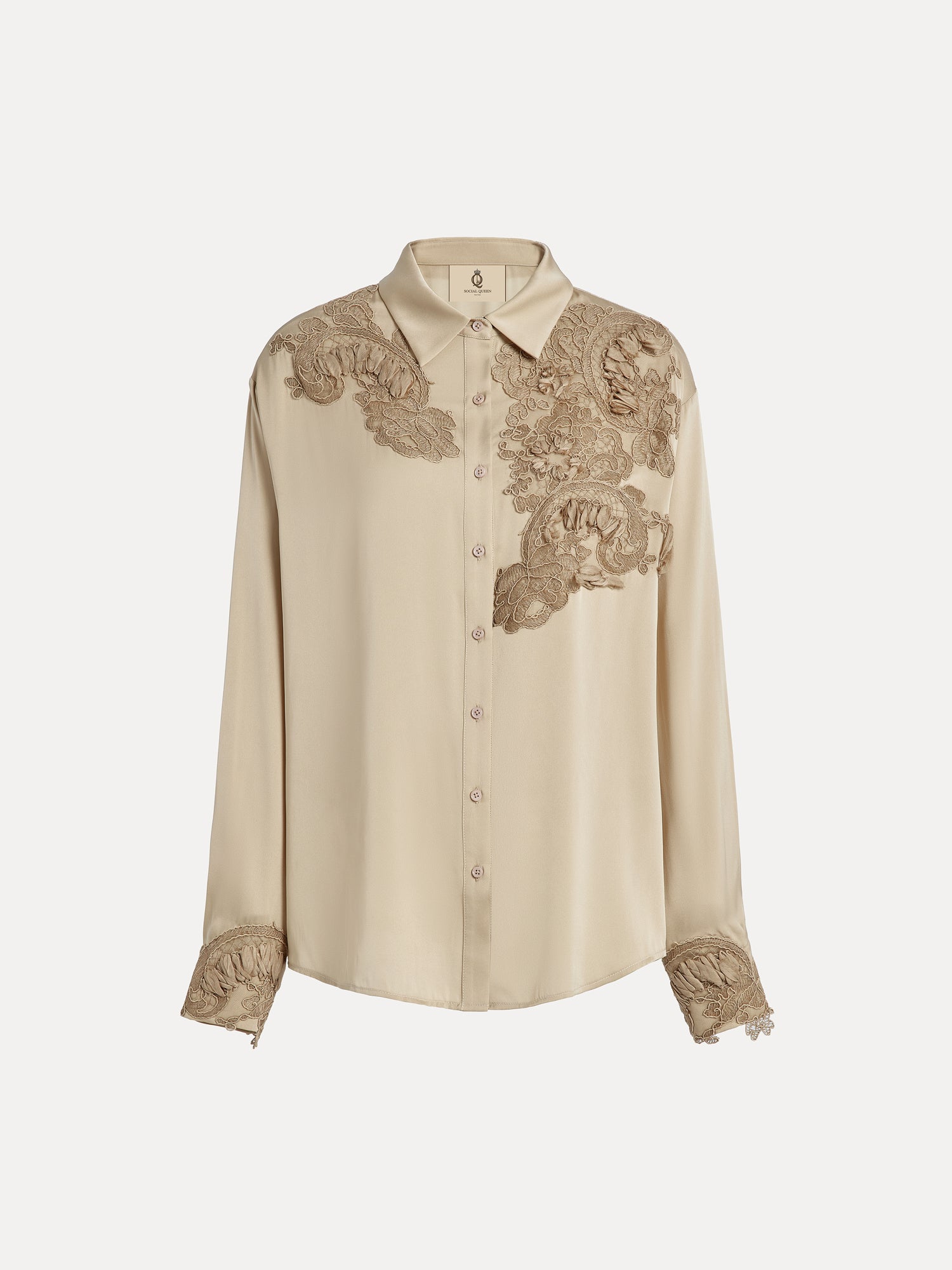 The Social Queen 100% Silk Retro Floral Appliqué Satin Blouse features beige long sleeves and 3D floral accents on the shoulders, chest, and cuffs, shown against a plain white background.