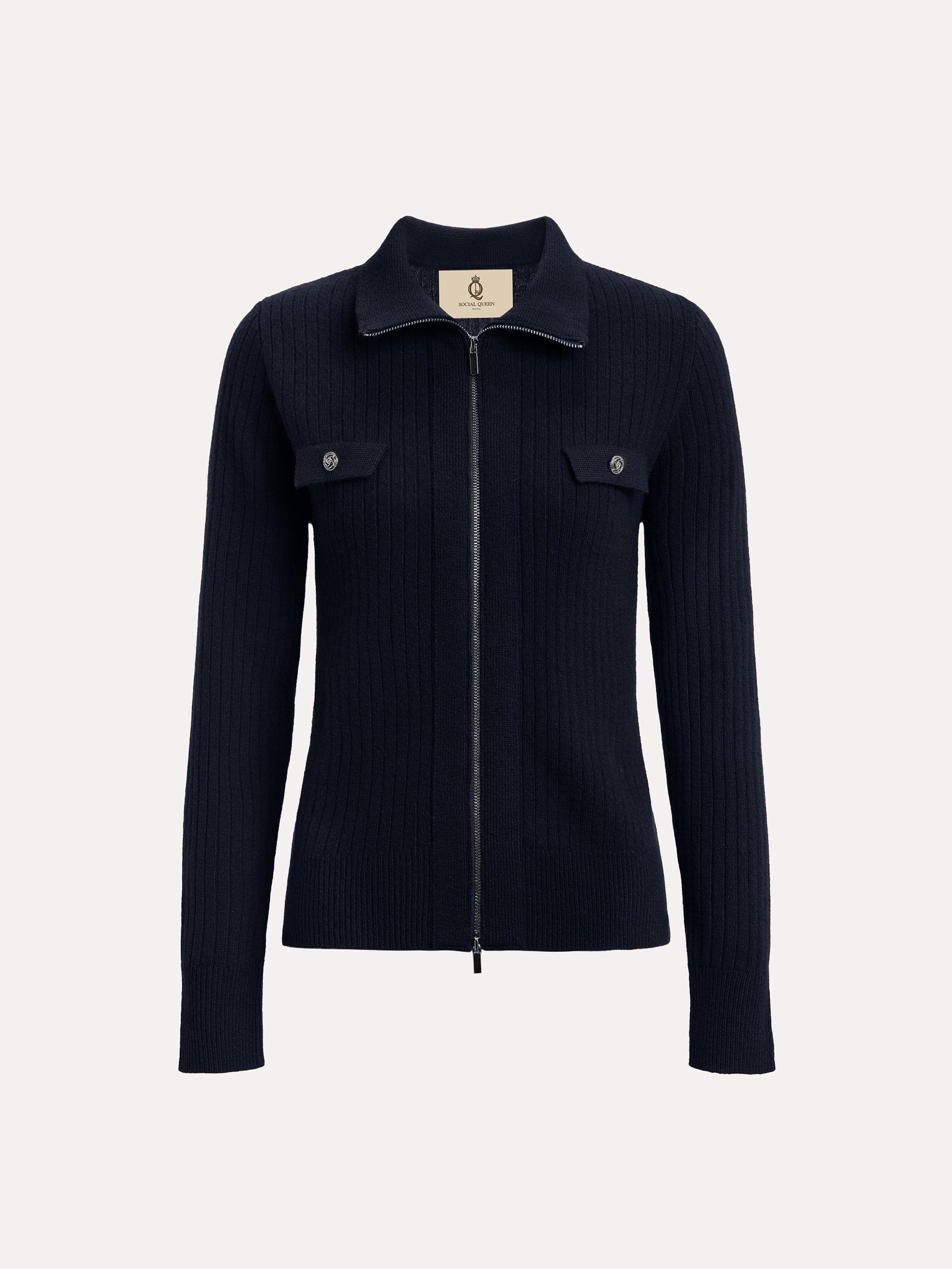 The Social Queen 100% Wool Knit Jacket is navy blue with a ribbed knit, hand-optimized zippers, two chest pockets with button flaps, a collar, and long sleeves, shown on a white background.