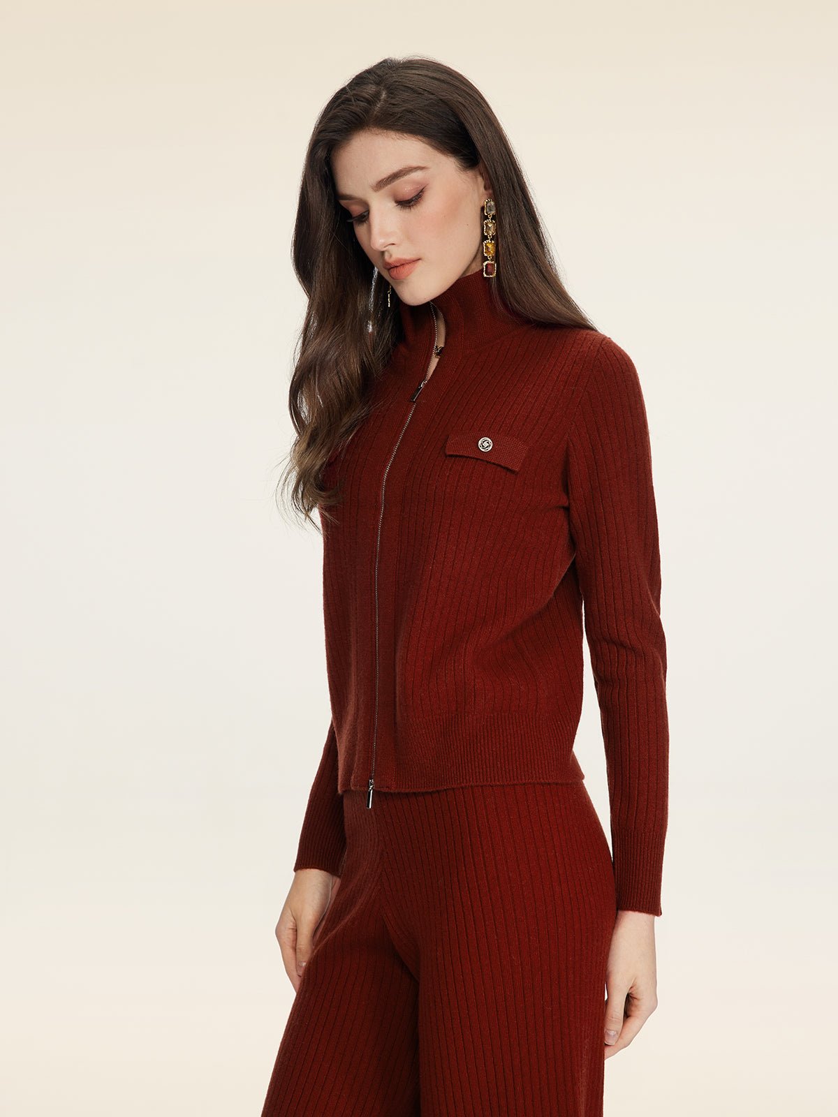 A woman with long brown hair wears the Social Queen 100% Wool Knit Jacket, maroon and ribbed, against a plain light background.