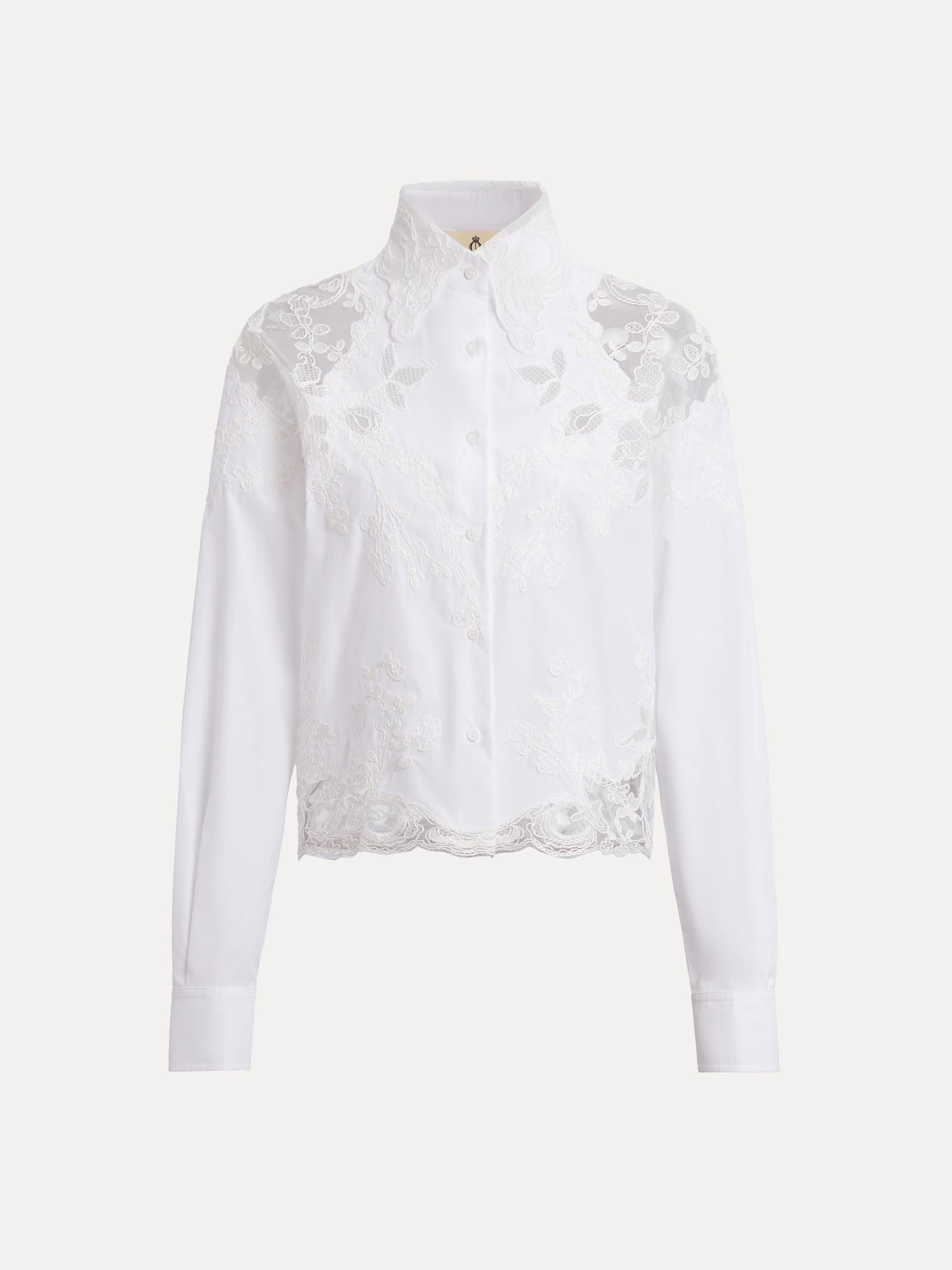 The Cropped Embroidered Lace Panel Blouse by Social Queen features long sleeves, a high collar, button-down front, and hand-stitched floral lace detailing on the chest and sleeves.