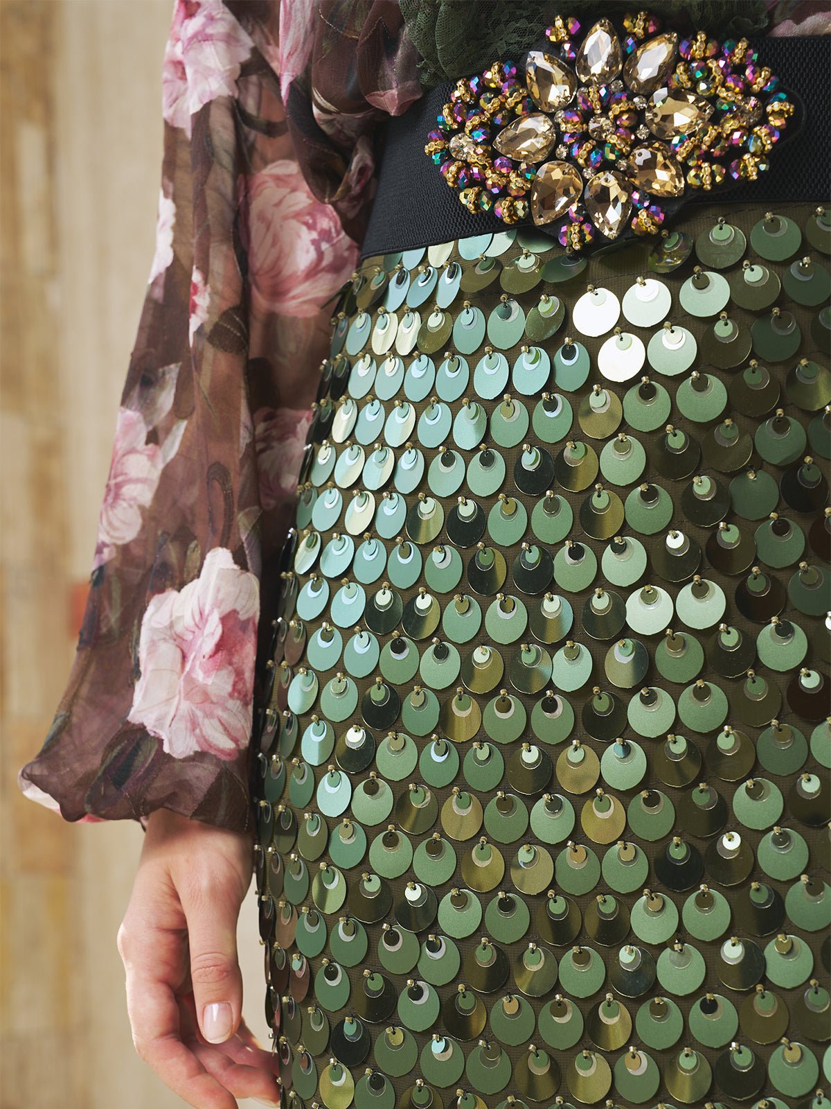 A close-up of a woman's dress featuring the Crystal-Embellished Elastic Waist Belt by Social Queen.