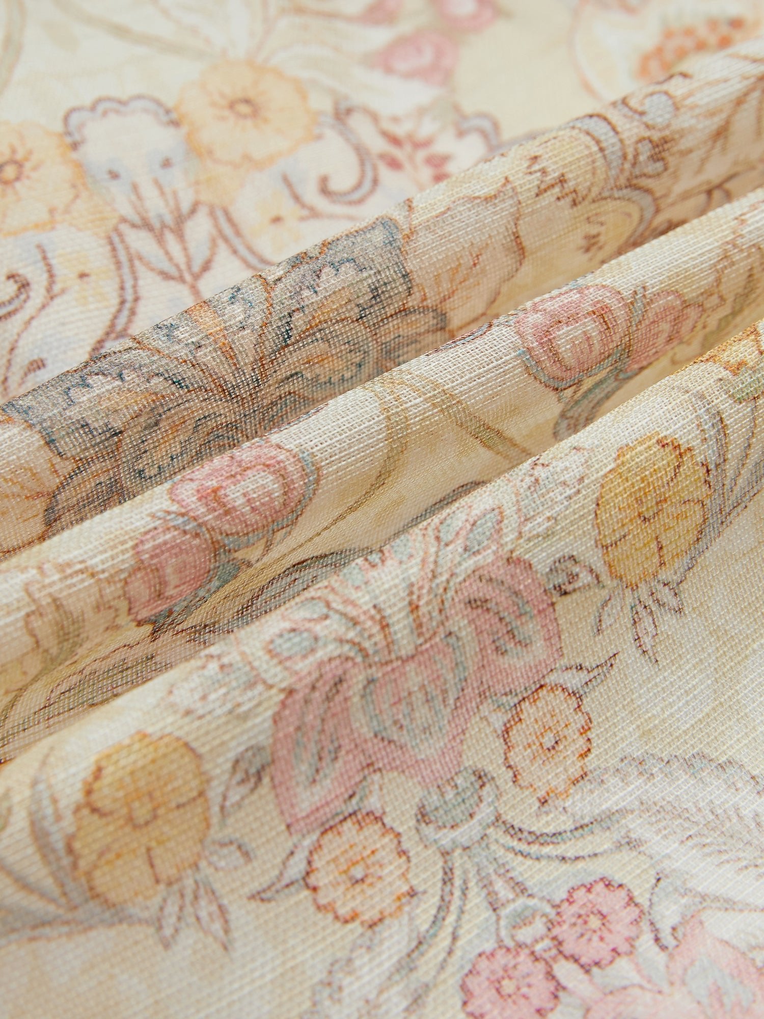 Close-up of Social Queen’s Floral Print Collared Blouse, made of light, semi-sheer fabric with pastel yellow, pink, and peach flowers plus green and brown leaves—ideal for a fresh spring look.