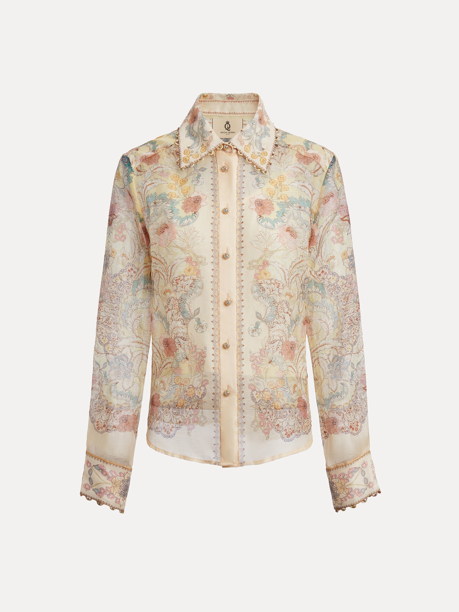 The Social Queen Floral Print Collared Blouse features sheer linen, pastel floral print, long sleeves, a button-up front, pointed collar, and lace-trimmed cuffs and edges.