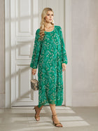 Woman in the Social Queen 100% Silk Beaded Embroidery Dress, paired with gold sandals and a small snakeskin handbag, standing indoors by a white door.