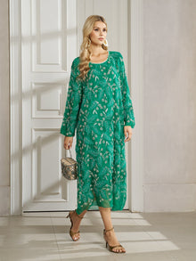 Woman in the Social Queen 100% Silk Beaded Embroidery Dress, paired with gold sandals and a small snakeskin handbag, standing indoors by a white door.