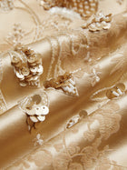 Close-up of the Social Queen 100% Silk Floral Embroidered Satin Jacket, showcasing hand-embroidered jacquard floral patterns with sequin clusters for a textured, reflective look.