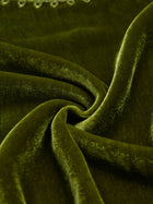 Close-up of the Social Queen 100% Silk Velvet Lace-Panel Blouse in green, highlighting its soft texture, twisted fold, and subtle light reflections for a vintage luxe feel.