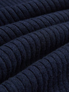 Close-up of dark blue, horizontally ribbed fabric from Social Queen's 100% Wool Knit Elastic Trousers, featuring evenly spaced textured lines and an elastic waistband.