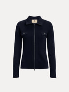 The Social Queen 100% Wool Knit Jacket is navy blue with a ribbed knit, hand-optimized zippers, two chest pockets with button flaps, a collar, and long sleeves, shown on a white background.