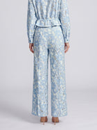 Back view of Social Queen Floral Lace Wide-Leg Pants in a light blue floral lace pattern.