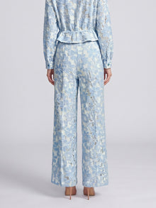 Back view of Social Queen Floral Lace Wide-Leg Pants in a light blue floral lace pattern.