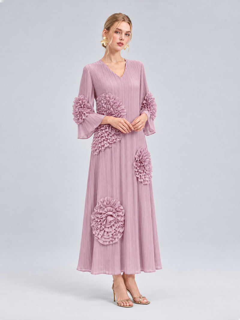 Social Queen 3D Floral Pleated Dress in mauve, a pleated V-neck midi dress featuring layered 3D floral appliqué on the sleeves and skirt.