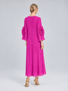A model showcases the Social Queen 3D Floral Pleated Dress—a vibrant pink midi design featuring ruffled sleeve accents and intricate floral appliqué—facing away from the camera in heels against a plain light gray background.