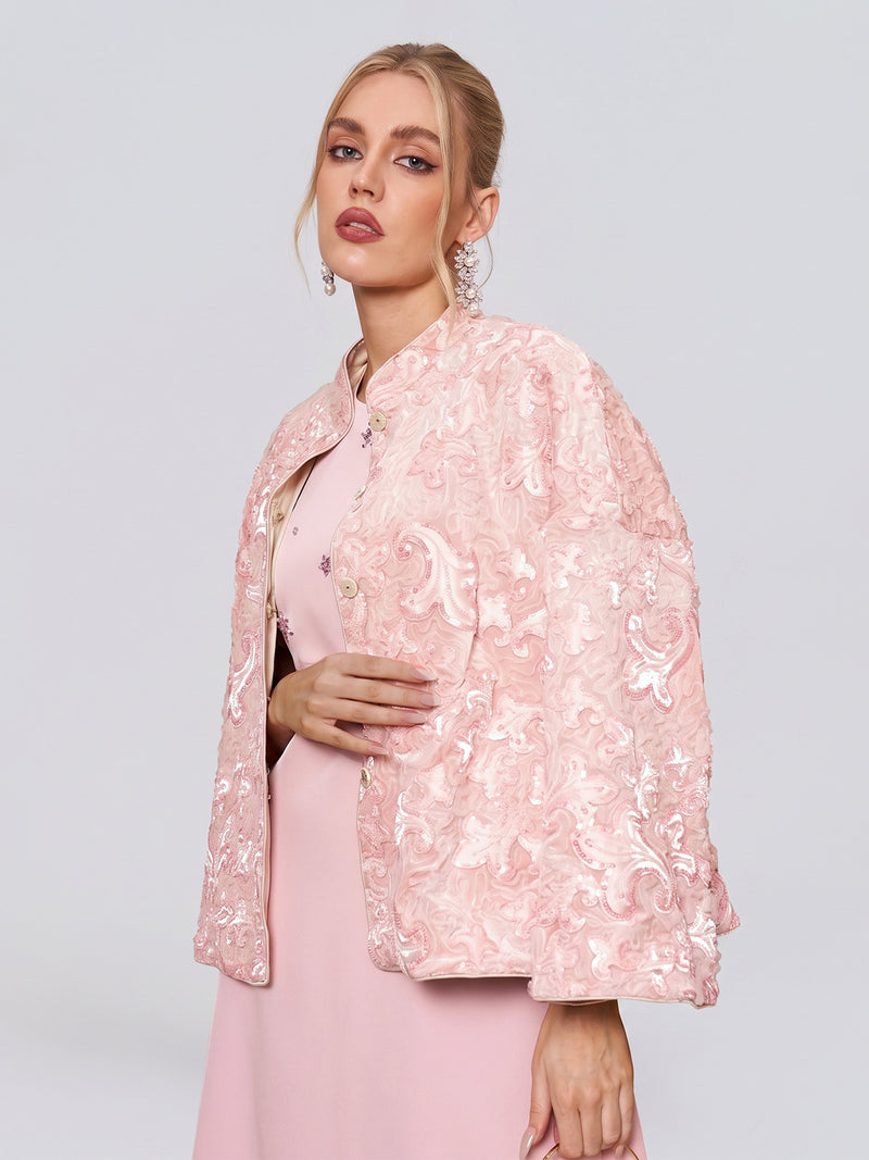 A woman wearing the Social Queen Stand-Collar Beaded Jacquard Jacket in light pink over a pale pink dress, standing against a plain light background.