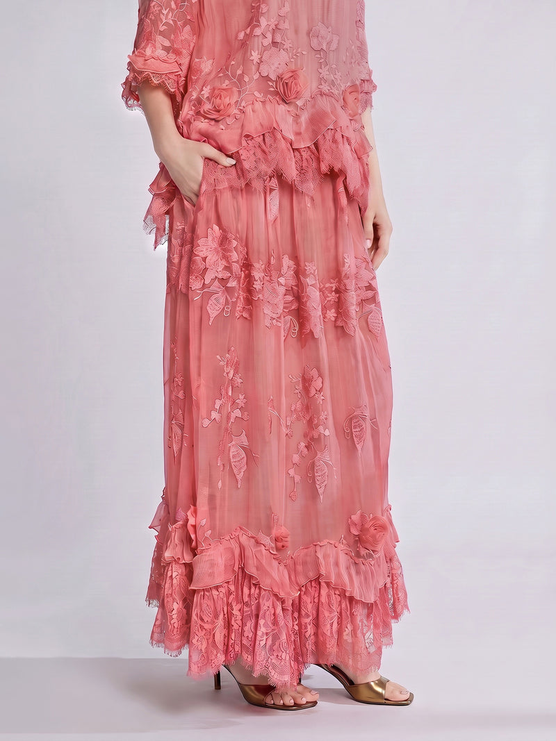 A person stands against a pale background in open-toe heels, wearing the Social Queen 3D Floral Embroidered 100% Silk Ruffle Skirt, which features intricate floral embroidery, delicate ruffled hems, and an elegant A-line silhouette.
