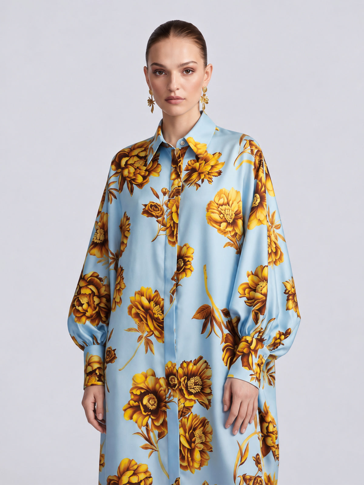 Social Queen Floral Print Maxi Shirtdress in light blue with a button-down front, long cuffed sleeves, and a relaxed silhouette.
