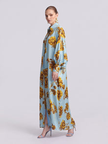 Social Queen Floral Print Maxi Shirtdress in light blue with a long-sleeved, relaxed silhouette and tie waist.