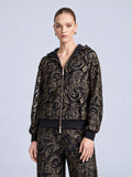 A model wearing a Social Queen Paisley Embroidered Lace Hooded Jacket in black, crafted from cutout lace with a gold-tone paisley pattern.