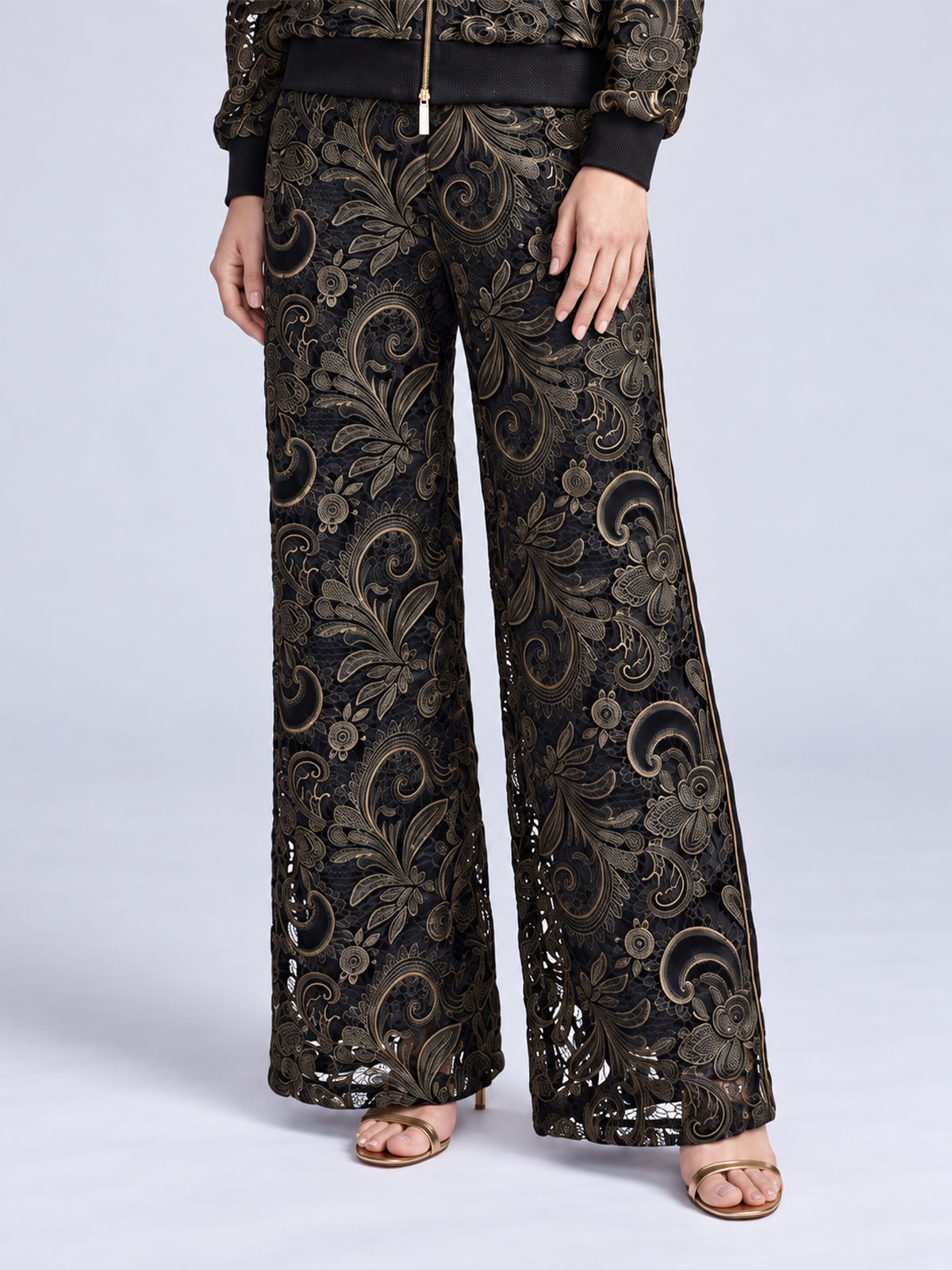 Social Queen Paisley Embroidered Lace Wide-Leg Pants in black, featuring an intricate gold paisley embroidery.