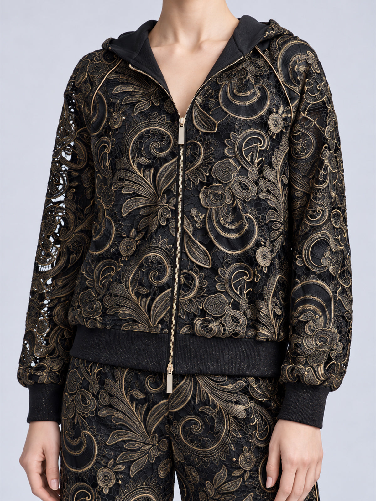 Social Queen Paisley Embroidered Lace Hooded Jacket in black, featuring a zip-up design with gold-tone paisley embroidery and cutout lace detailing.