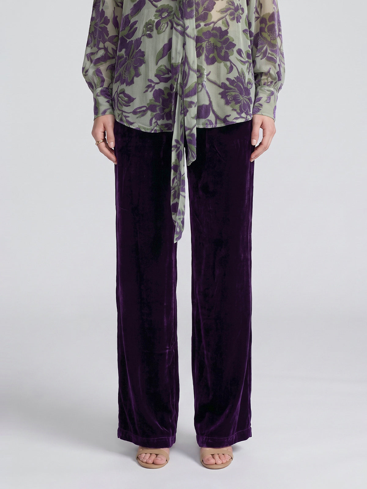 Deep purple Velvet Wide-Leg Pants by Social Queen with a straight-cut, wide-leg fit and elasticated waistband, paired with a sage green floral print blouse.