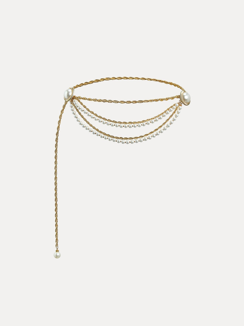 The Social Queen Baroque Pearl Chain Belt showcases a layered gold chain with three draping strands and baroque pearl accents at the ends and side, displayed on a white background.