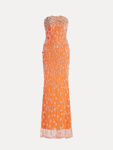The Beaded Crystal Strapless Gown by Social Queen features a fitted, floor-length orange design adorned with silver and clear crystal beads and sequins.