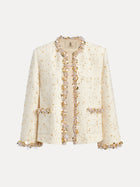 The Social Queen Beaded Floral Embroidered Tweed Jacket features vintage-inspired cream tweed, gold thread, and sequin accents on the collar, front, pockets, and sleeves, shown against a white background.