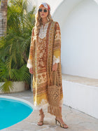A person stands by a pool wearing the Social Queen Boho Lace Floral Print Dress, paired with gold sandals, sunglasses, a headscarf, and holding a woven fringe bag.
