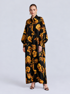 Social Queen Floral Print Maxi Shirtdress in black, a long-sleeved, floor-length floral print dress with a relaxed silhouette, worn with black strappy heels.