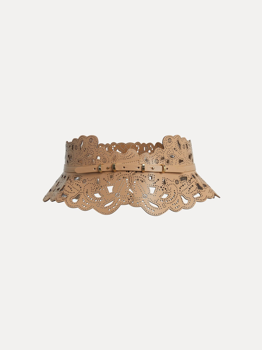 The Carved Leather Boho Cutout Belt by Social Queen features a tan, wide design with intricate cut-out patterns, scalloped edges, and a central buckle for authentic boho style.
