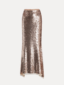 The Champagne Sequin Mermaid Skirt by Social Queen features a long, fitted silhouette with rose gold sequins and a slight flare at the hem, shown against a plain white background.