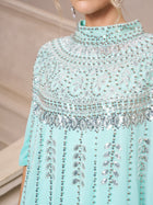 A person wearing the Social Queen Crystal-Embellished Cape Dress in light blue chiffon with silver beadwork, sequins, and embellishments, photographed from the shoulders down.