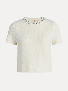 The Social Queen Crystal & Sequin Knit Textured Crop Top is a minimalist cream short-sleeve top with a round neckline and sparkling rhinestone accents.