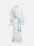 Social Queen's Floral Embroidered Lantern Sleeve Dress: a white, ankle-length piece with hand-embroidered florals, lantern sleeves, ruffled hem, and a light blue tassel tie. High neck with bow adds summer sophistication.