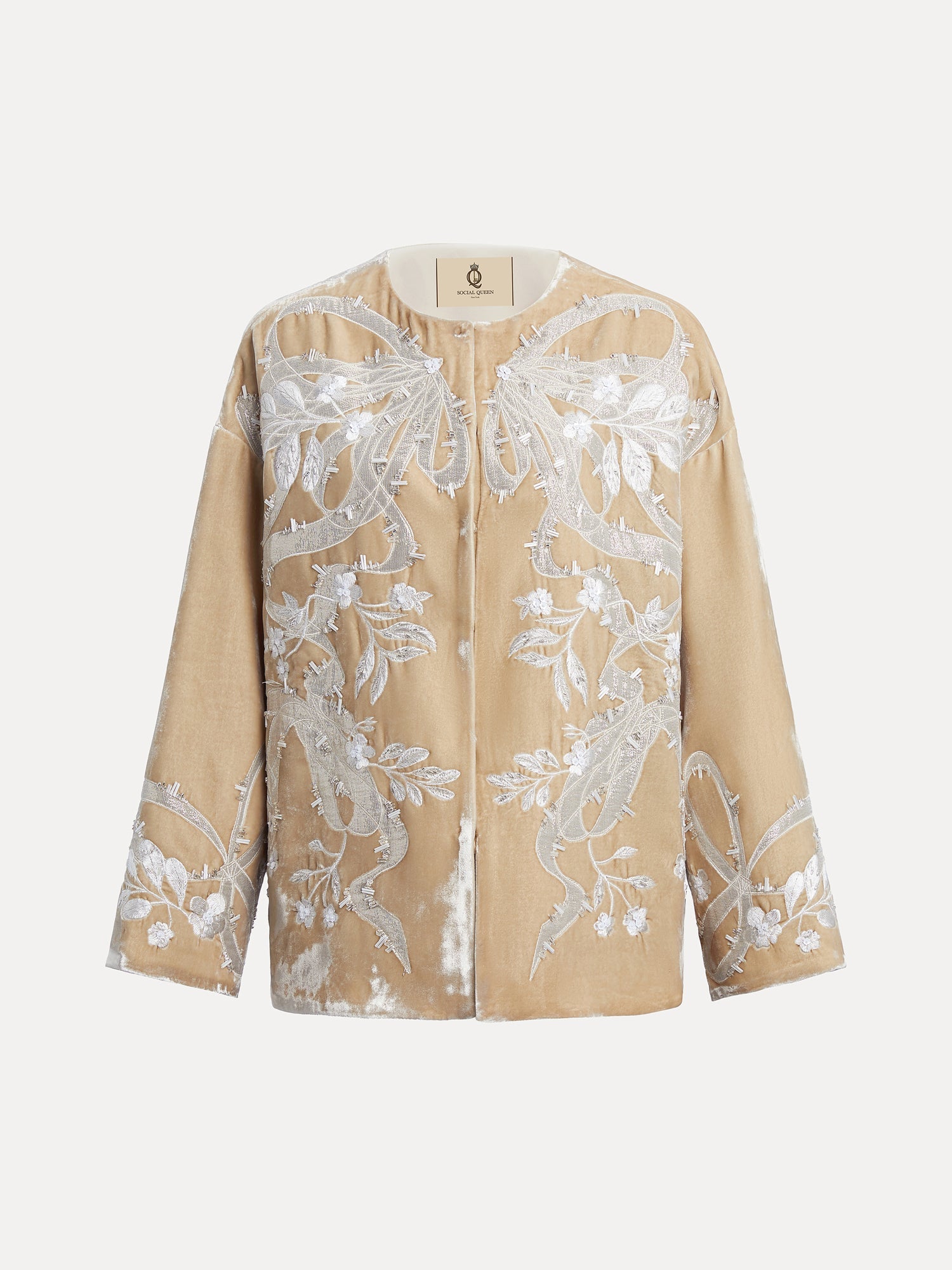 The Social Queen Floral Embroidered Velvet Jacket features tan velvet in an A-line cut with hand-embroidered floral and fish motifs, shown on a plain white background.