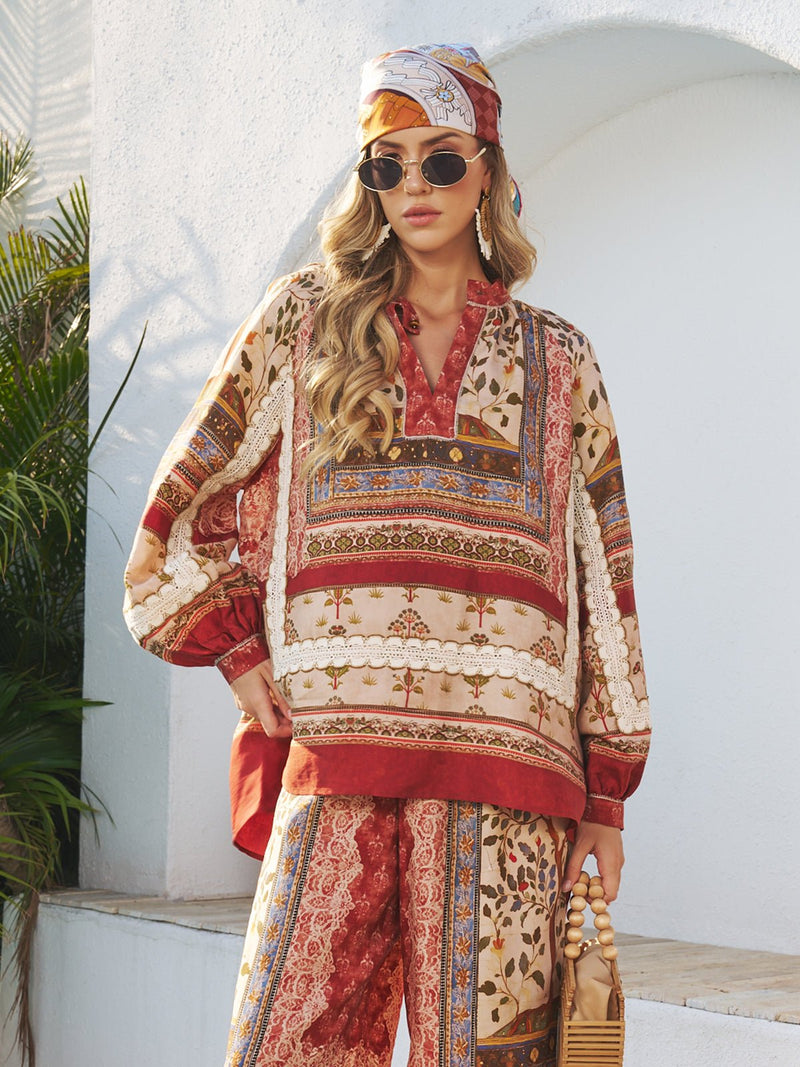A woman wearing sunglasses, a headscarf, and the Social Queen Floral Print Lace Boho Blouse stands outdoors by a white wall with plants nearby.
