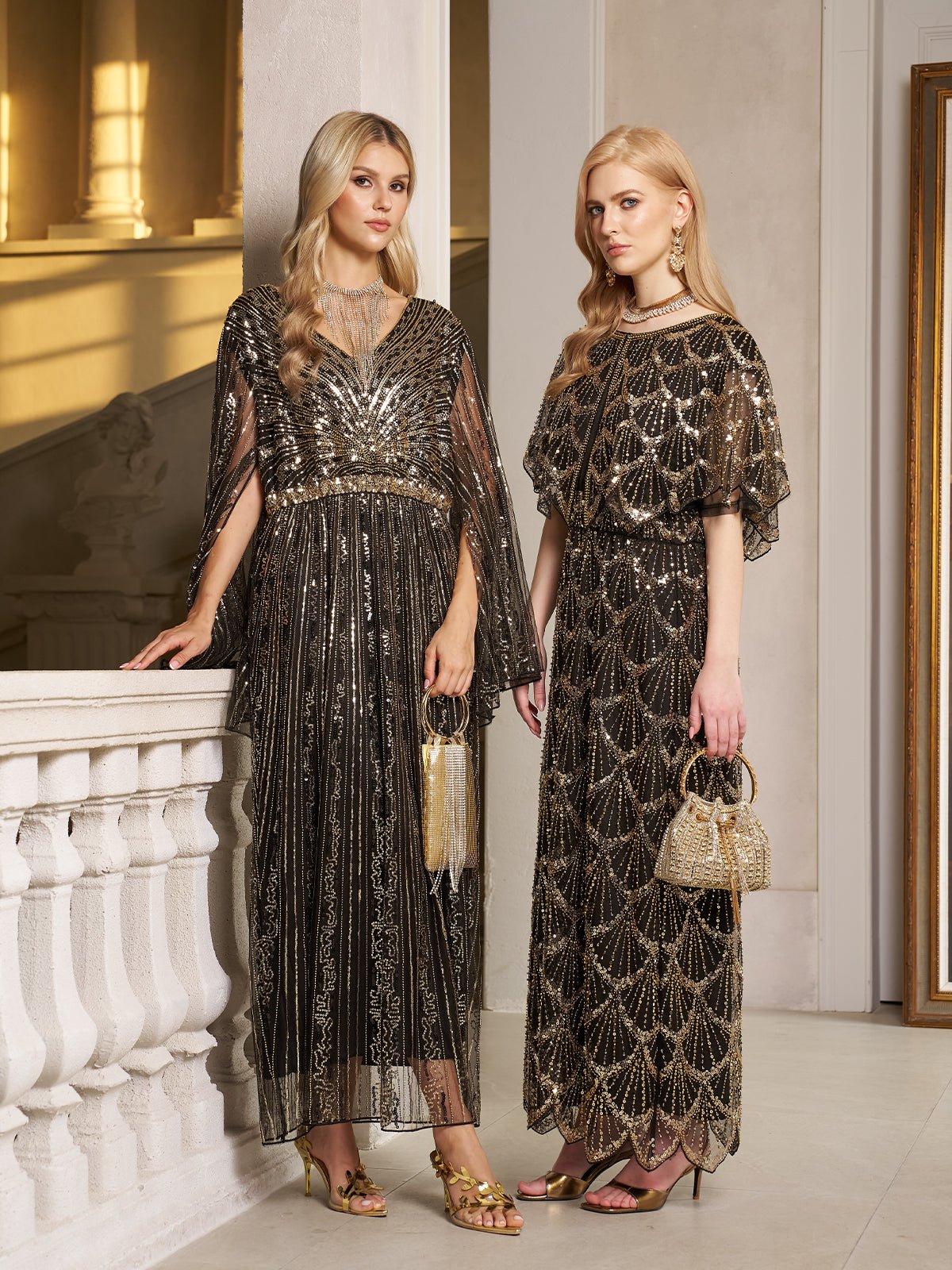 Two women wear Social Queen's Gilded Beaded Cape Dress indoors, each holding a small handbag and wearing gold heels—a chic choice for an elegant evening or formal cocktail event.