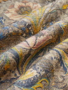 Close-up of the Social Queen Hand-Beaded Printed Jacket, featuring intricate floral details in blue, yellow, pink, and beige tones, highlighting its hand-crafted quality and fine texture.