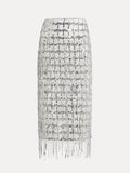 The Social Queen Hand-Embellished Sequin Fringe Skirt is a high-waisted skirt with a silver sequin grid pattern and fringe detailing at the hem.