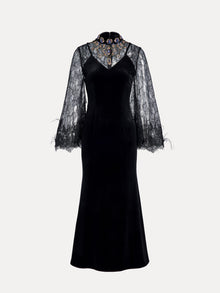 The Social Queen Hand-Sewn Crystal Velvet Feather Mermaid Gown features black velvet, sheer lace bell sleeves, a high collar, jeweled neckline embellishments, and elegant lace details.