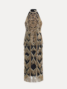 Social Queen’s Handcrafted Fringe Sequin Halter Gown features a sleeveless black-gold design, high neckline, hand-applied sequins, intricate gold beadwork, and long fringe detailing throughout.