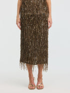 A person wears the Social Queen Sequin Fringe Midi Skirt with gold high-heeled sandals, ideal for special occasions, standing against a plain white background.