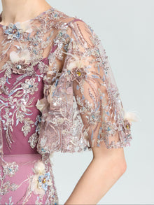 The Social Queen Floral Beaded A-Line Dress features sheer embellished sleeves and intricate floral beadwork—ideal for any special occasion.