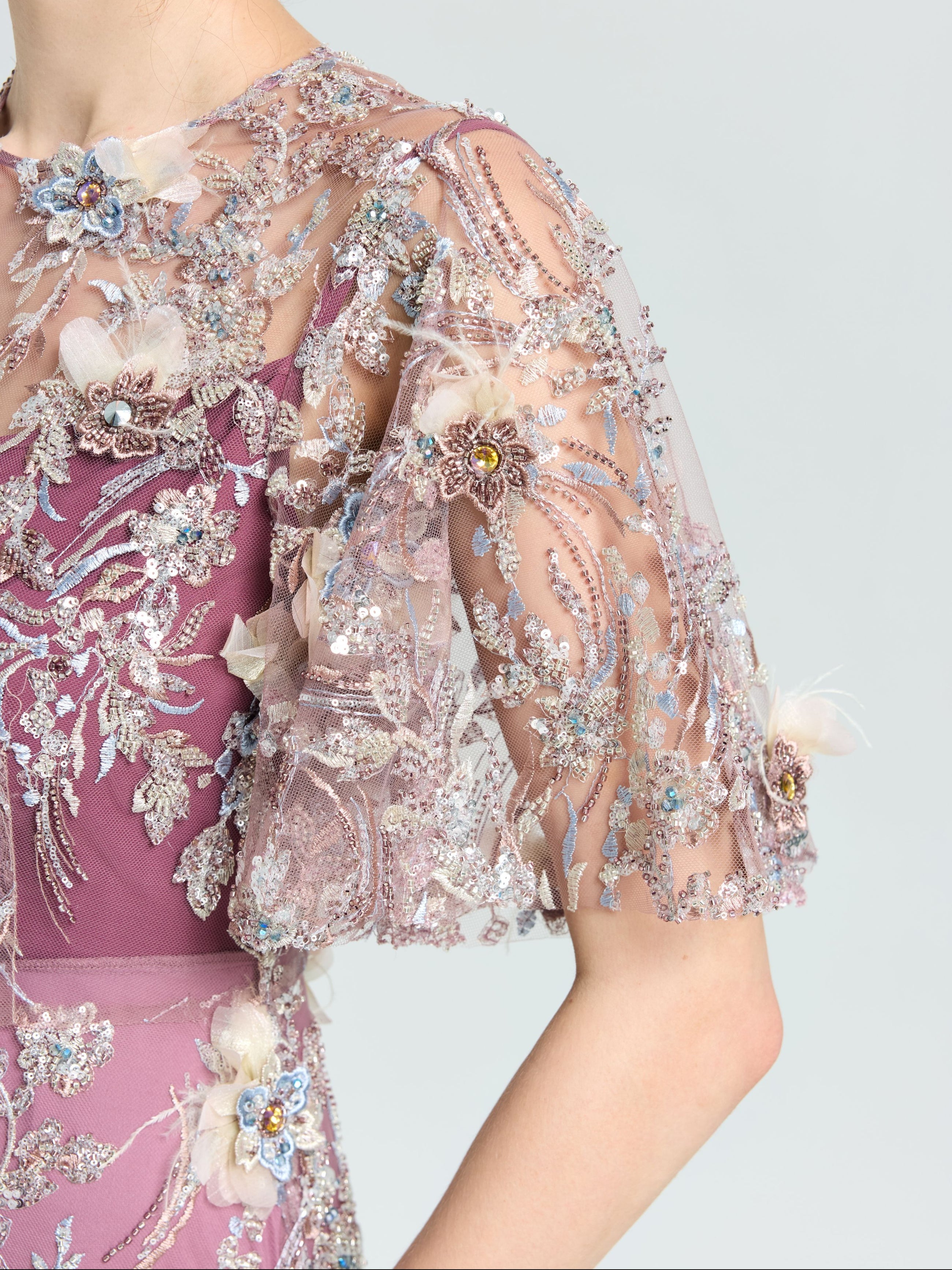 The Social Queen Floral Beaded A-Line Dress features sheer embellished sleeves and intricate floral beadwork—ideal for any special occasion.