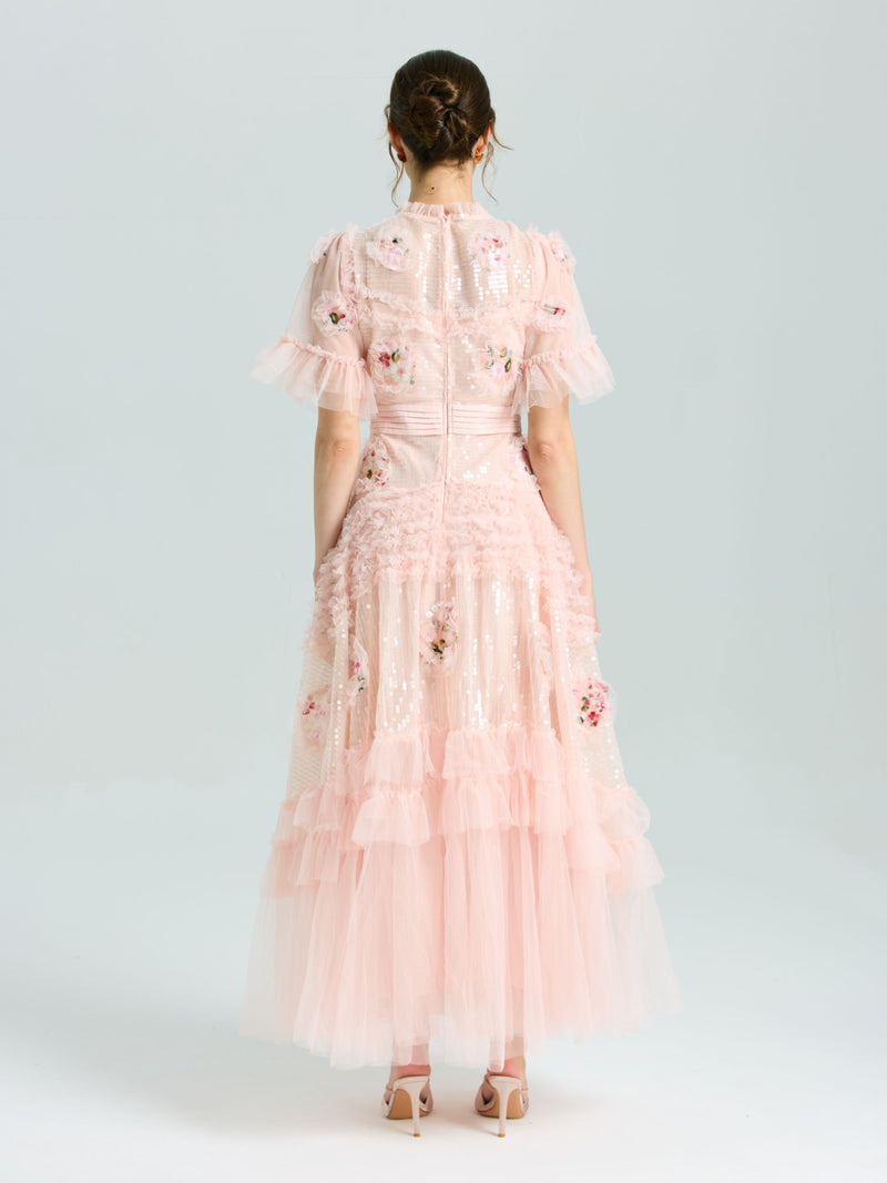 A woman in the Social Queen Embroidered Ruffle Tiered Tulle Dress stands in heels against a plain light background—the perfect special occasion look.