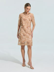 A woman models the Social Queen 3D Floral Appliqué Lace Shift Dress—knee-length, nude lace with floral details and half sleeves—paired with gold heels against a plain light background; ideal for special occasions.