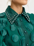 Close-up of the Social Queen Pearl Embellished Appliqué Dress, showcasing layered circular appliqués and a pointed collar adorned with crystal pearls and rhinestones.