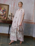 A woman wearing the Social Queen Baroque Garden Print Ramie Dress (includes slip dress) holds a colorful handbag as she stands indoors near a table decorated with ornaments and a framed floral painting.