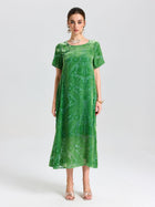 A woman faces forward against a plain light background, wearing the Social Queen Floral Silk Velvet Shift Dress (Cami Included), styled with sandals and jewelry.